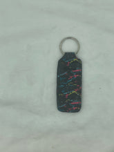 Load image into Gallery viewer, Head Feel Better Headache Balm with black splatter pouch