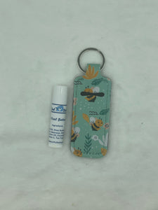 Head Feel Better Headache Balm with blue honeybee pouch