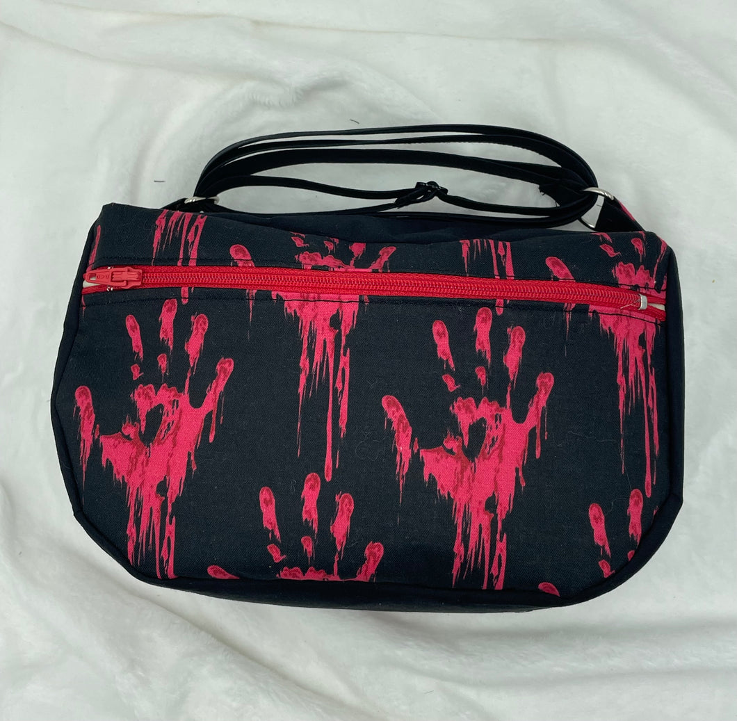 Bloody Handprint Boho Bitty Bag with outside zipper pocket