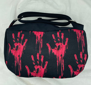 Bloody Handprint Boho Bitty Bag with outside zipper pocket