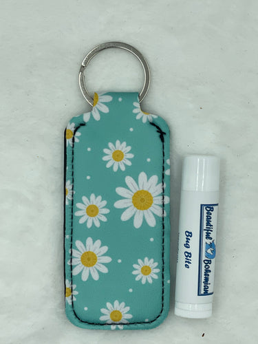 Bug Bite Relief Balm with small blue daisy holder