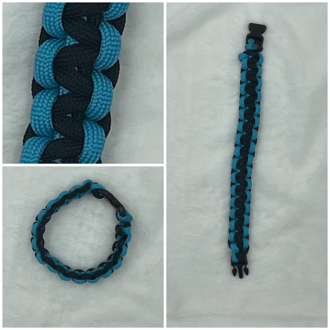 Light blue with black centre paracord bracelet